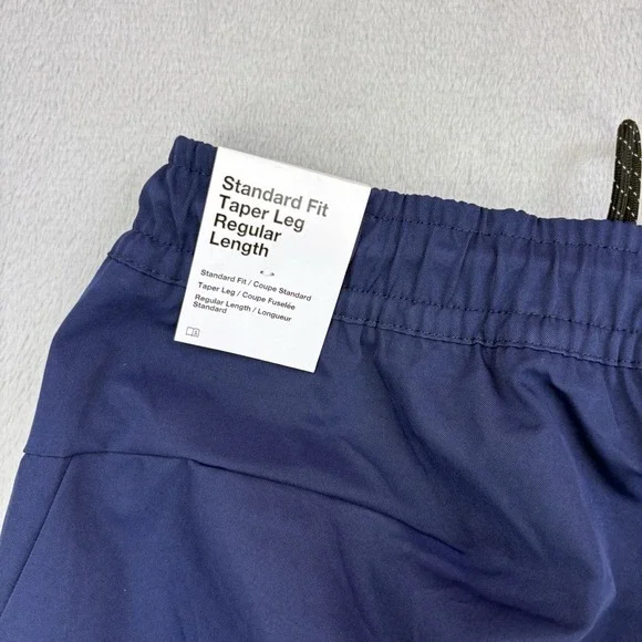 Nike Pants Mens Small Navy Sportswear Tech Essentials Commuter Woven Tapered Zip